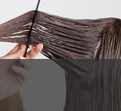 Image of combing hair with personal care additives and specialty surfactants